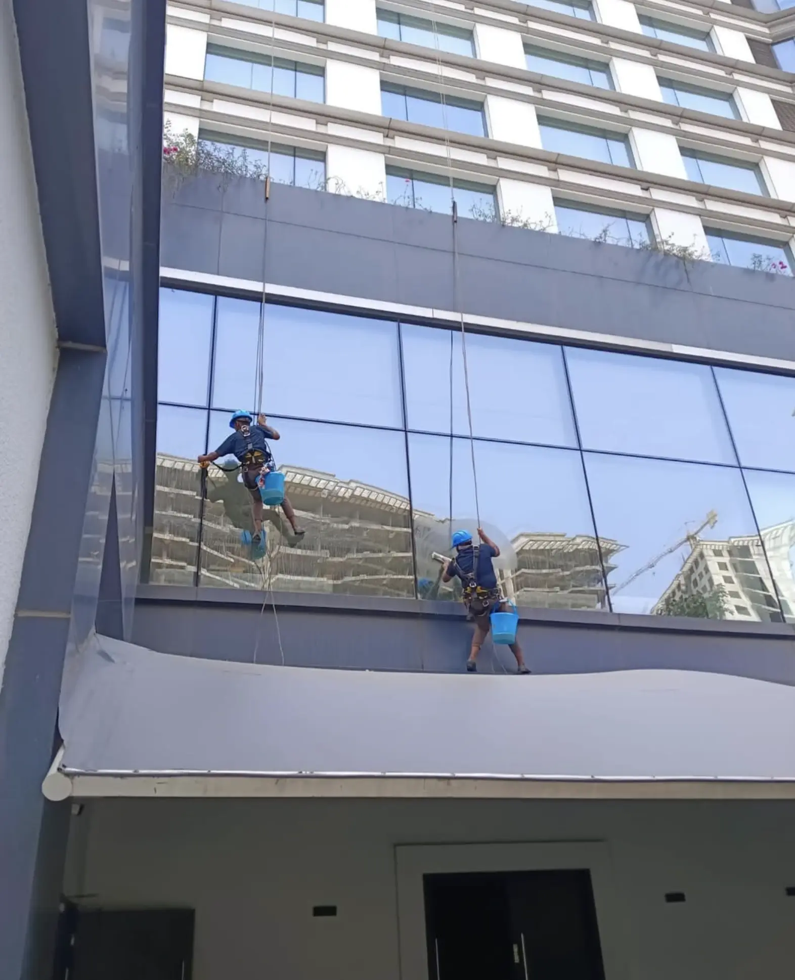 How do you clean windows in tall buildings from the inside?